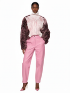 Maison Print Faux Fur Knit Sweater by GOLD x TEAL featuring washed distressed knit body with printed faux fur sleeves and relaxed turtleneck silhouette.