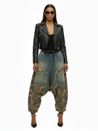 Recon Drop Pant by GOLD x TEAL featuring avant-garde drop-crotch denim silhouette with camo paneling and frayed detailing, front view