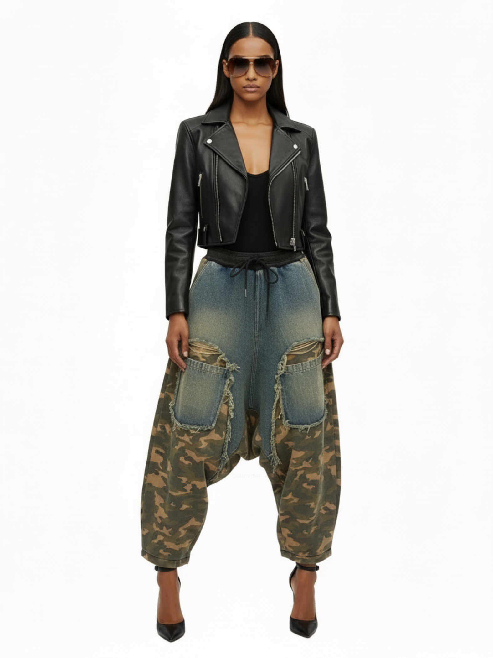 Recon Drop Pant by GOLD x TEAL featuring avant-garde drop-crotch denim silhouette with camo paneling and frayed detailing, front view