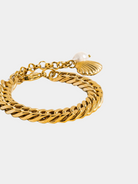 GOLDxTEAL chic 18k gold plated link bracelet accented with a a shell and freshwater peal charm.