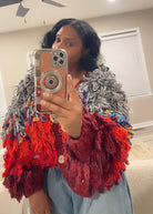 GOLD x TEAL ARTE LOOP SWEATER ON MODEL IRL DETAIL.