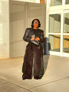 GOLDxTEAL black vegan leather paneled wide leg pants.