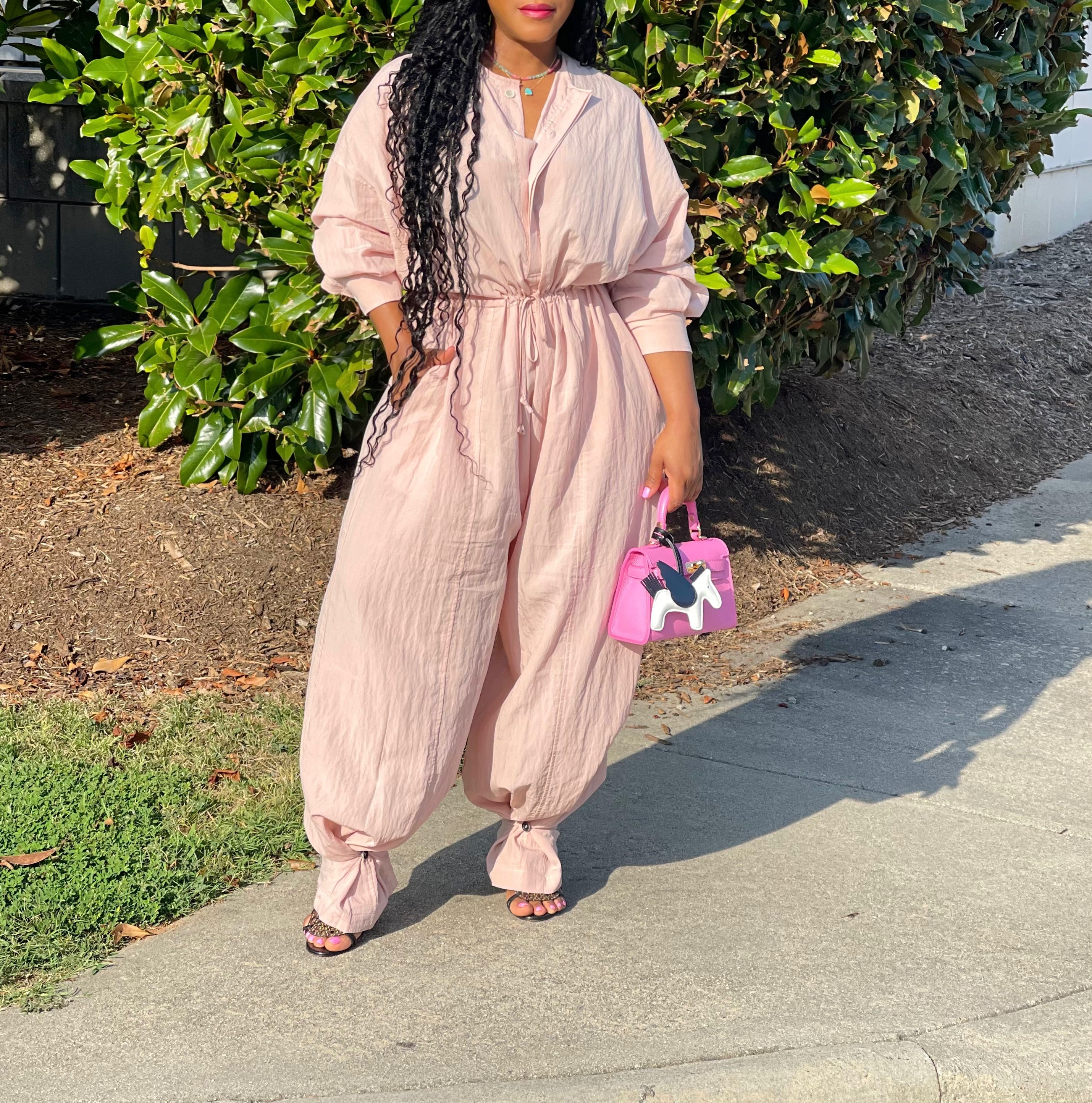 GOLDxTEAL Stylish blush pink nylon utilitarian jumpsuit.