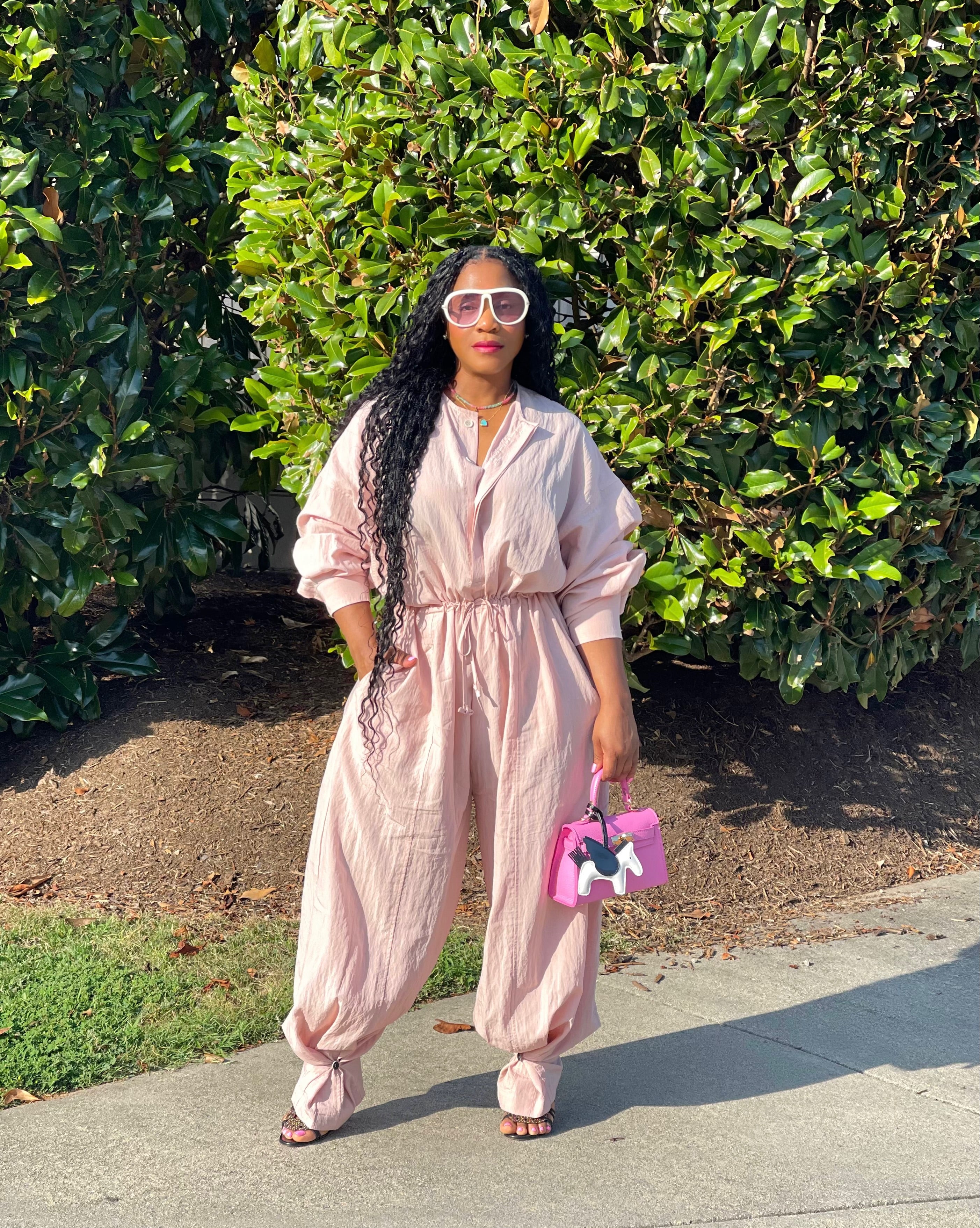 GOLDxTEAL Stylish blush pink nylon utilitarian jumpsuit.