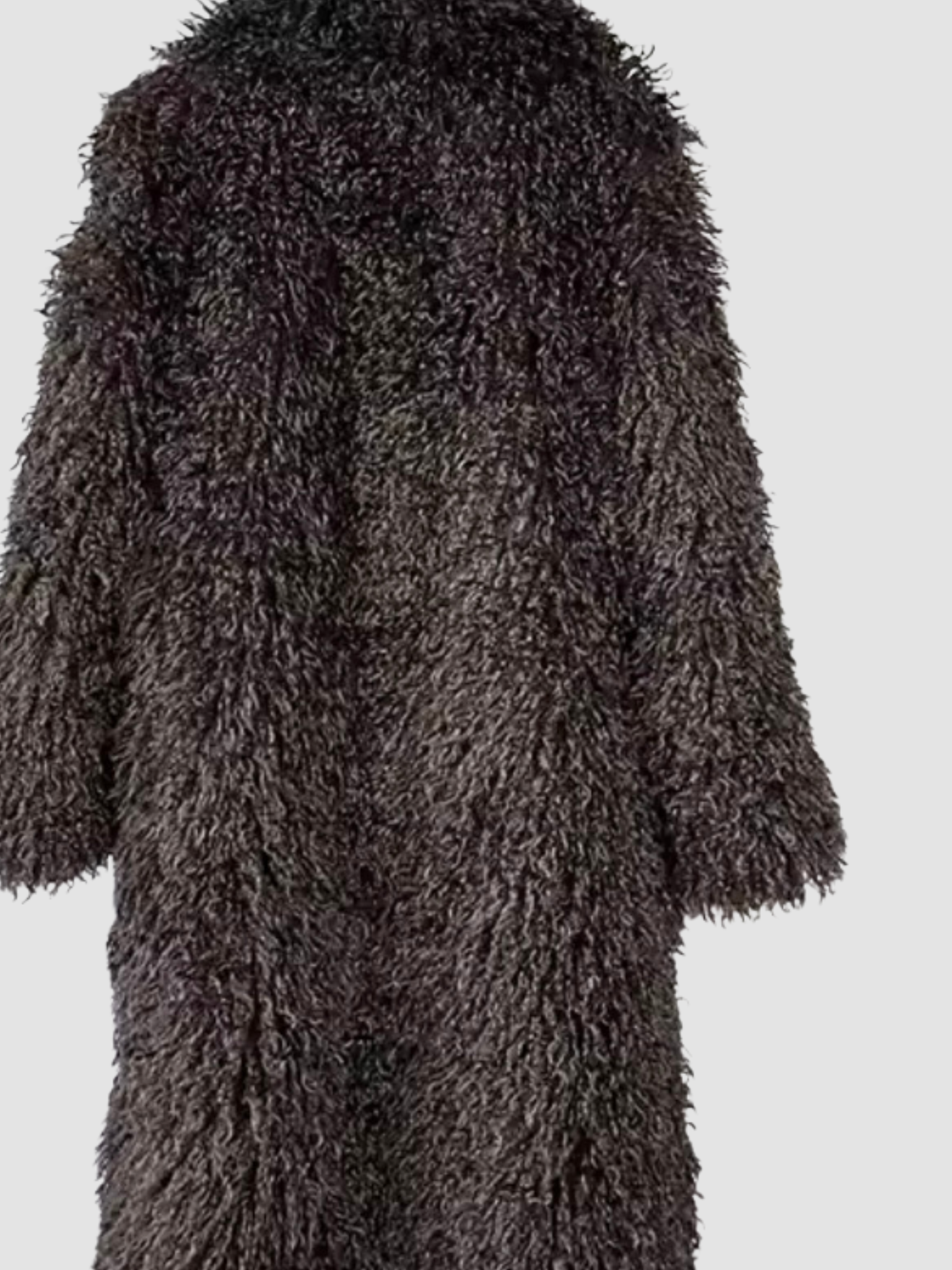 Close-up texture detail of the GOLD x TEAL Mocha Opulence Coat showcasing rich mocha faux Mongolian fur.