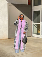 GOLDxTEAL black and white chevron print faux fur coat accented with lavender faux fur.