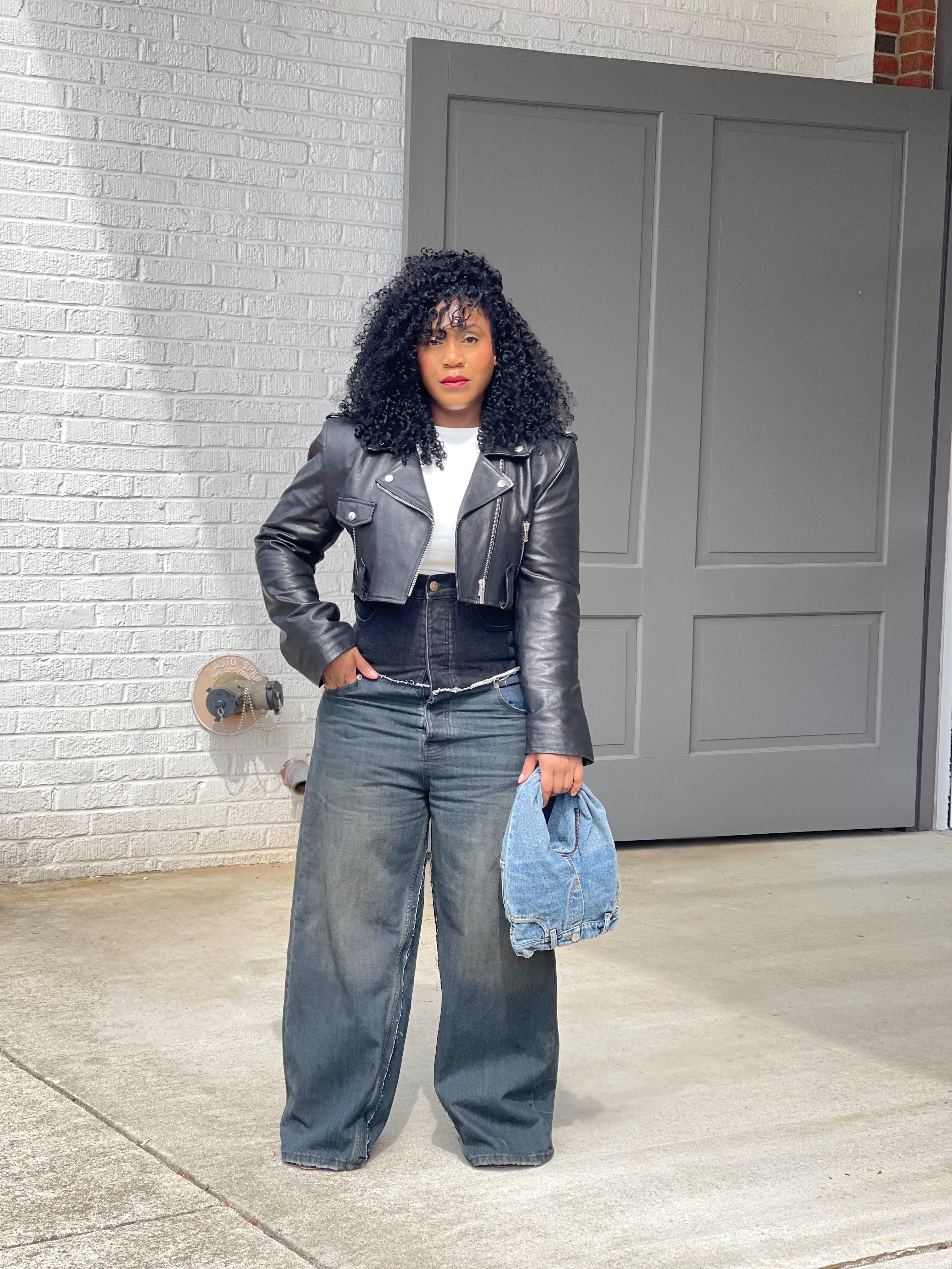 GOLDxTEAL high waisted black vintage blue paneled jeans.