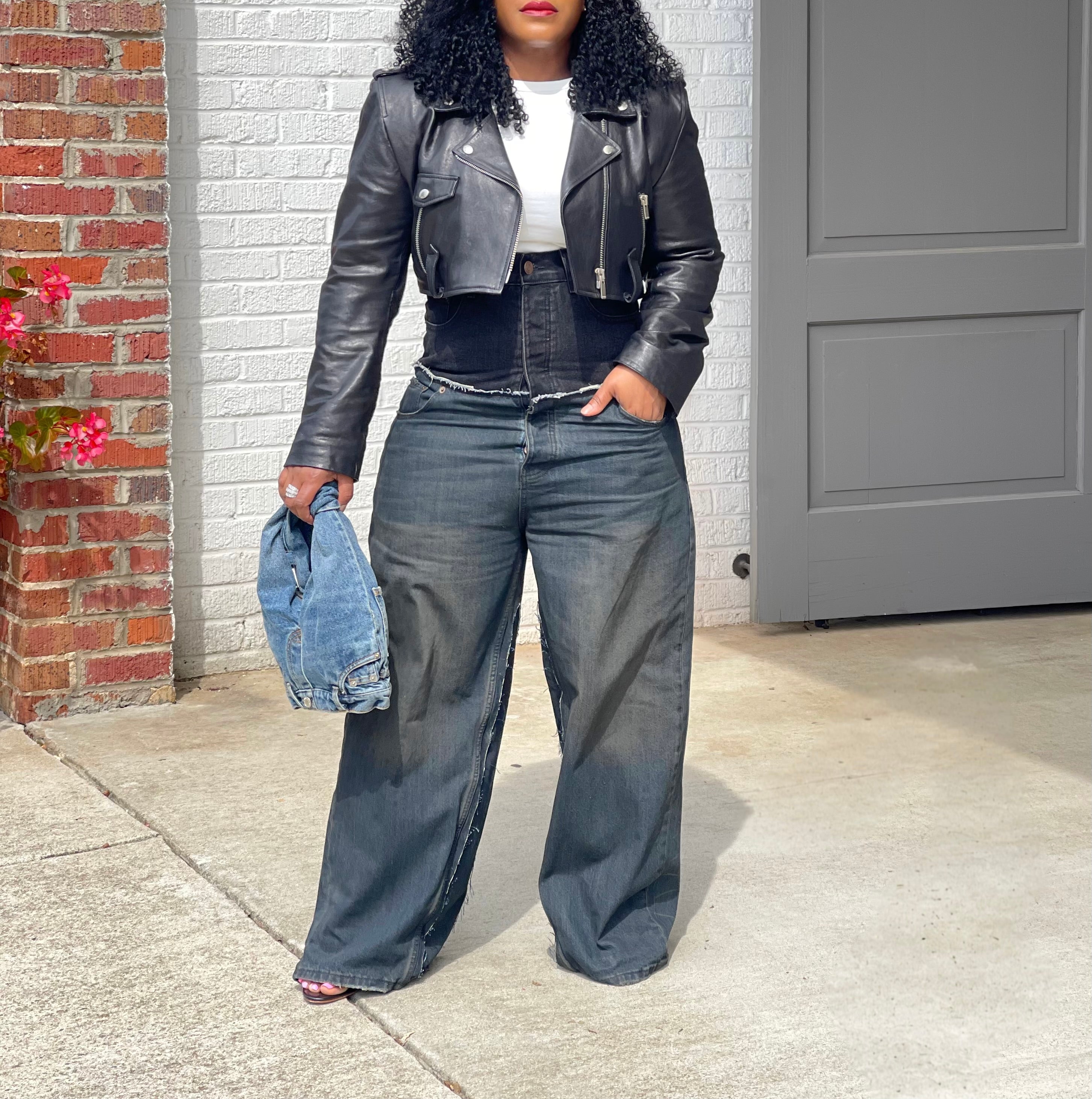 GOLDxTEAL high waisted black vintage blue paneled jeans.