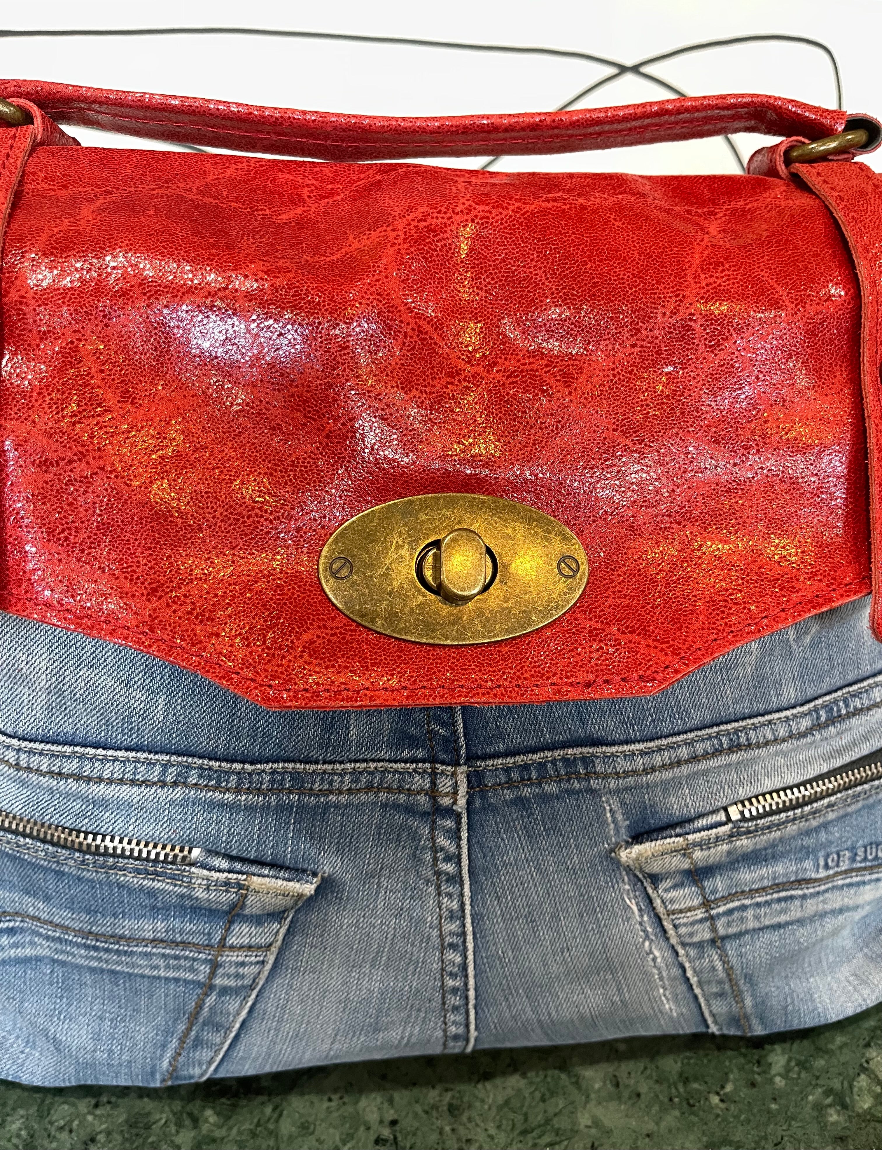 GOLDxTEAL stylish handmade denim and red leather handbag.