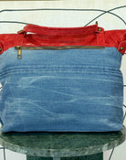 GOLDxTEAL stylish handmade denim and red leather handbag.