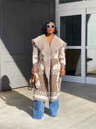 GOLDxTEAL stylish and chic mid length fringe cardigan with an oversized shawl collar.