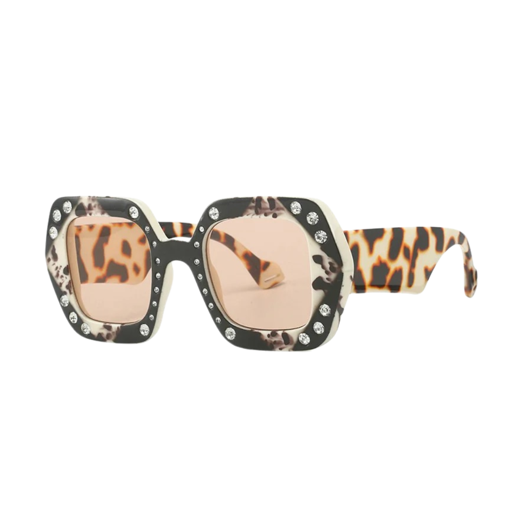 GOLDxTEAL oversized square frame sunglasses with stone embellishments.