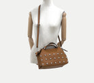 GOLDxTEAL handmade leather studded carryall handbag.