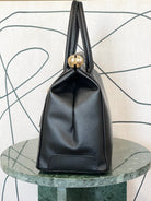 GOLDxTEAL gorgeous premium leather lock handbag.