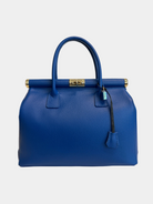 GOLDxTEAL gorgeous blue electric leather handbag with gold tone metal lock.