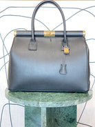 GOLDxTEAL gorgeous premium leather lock handbag.