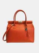 GOLDxTEAL gorgeous orange leather gold metal lock handbag.