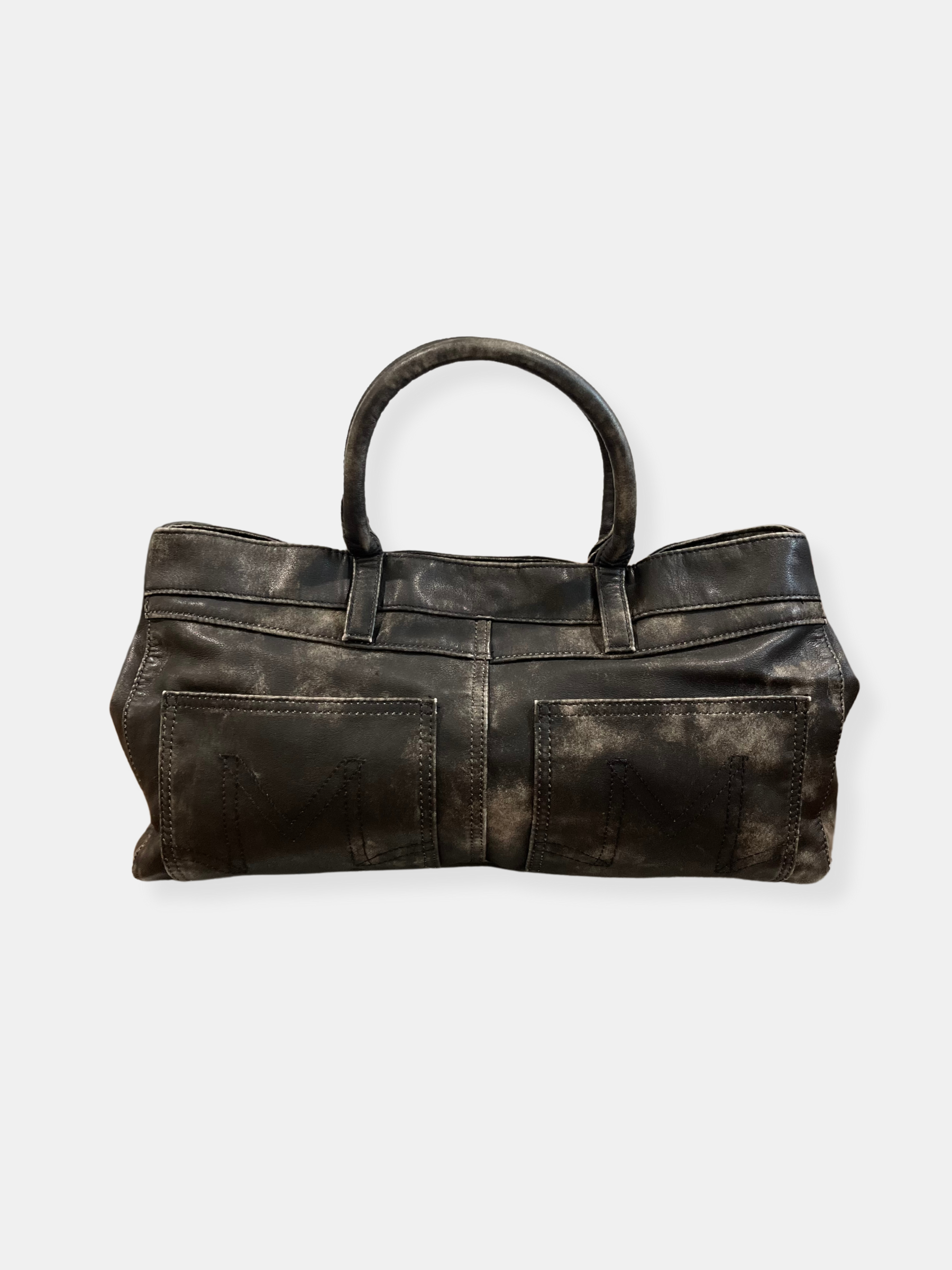 GOLDxTEAL distressed vegan leather handbag.