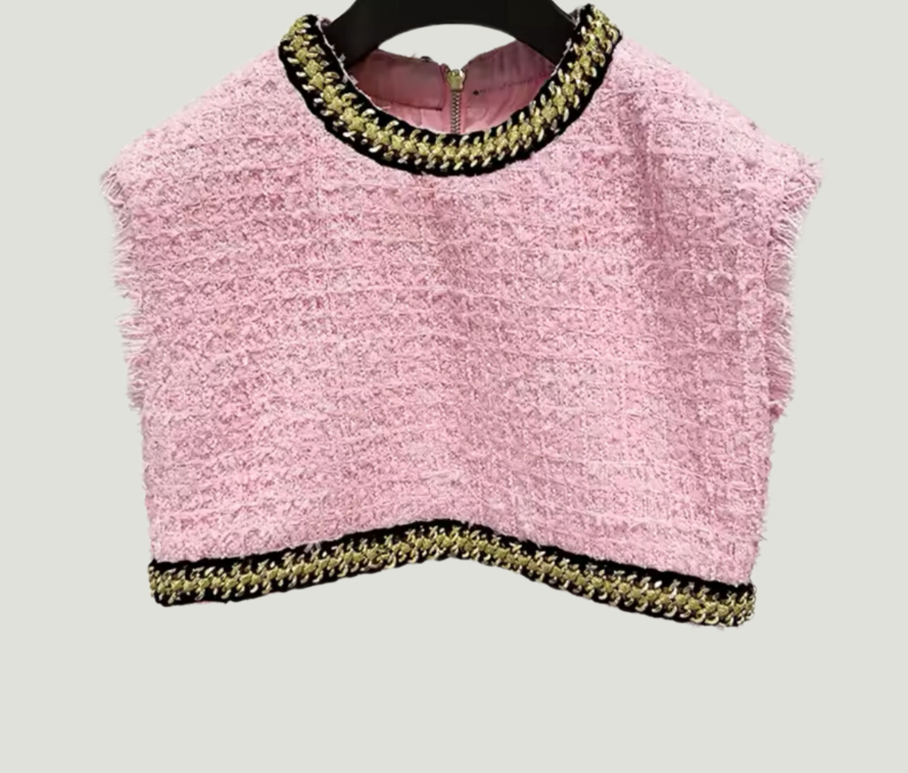 GOLDxTEAL pink tweed crop top with chain embellishment.