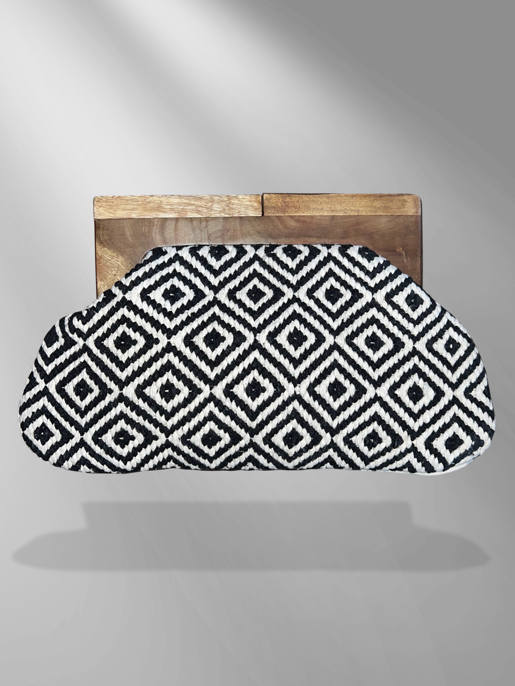 GOLDxTEAL gorgeous wooden handle clutch with black and white woven tapestry.