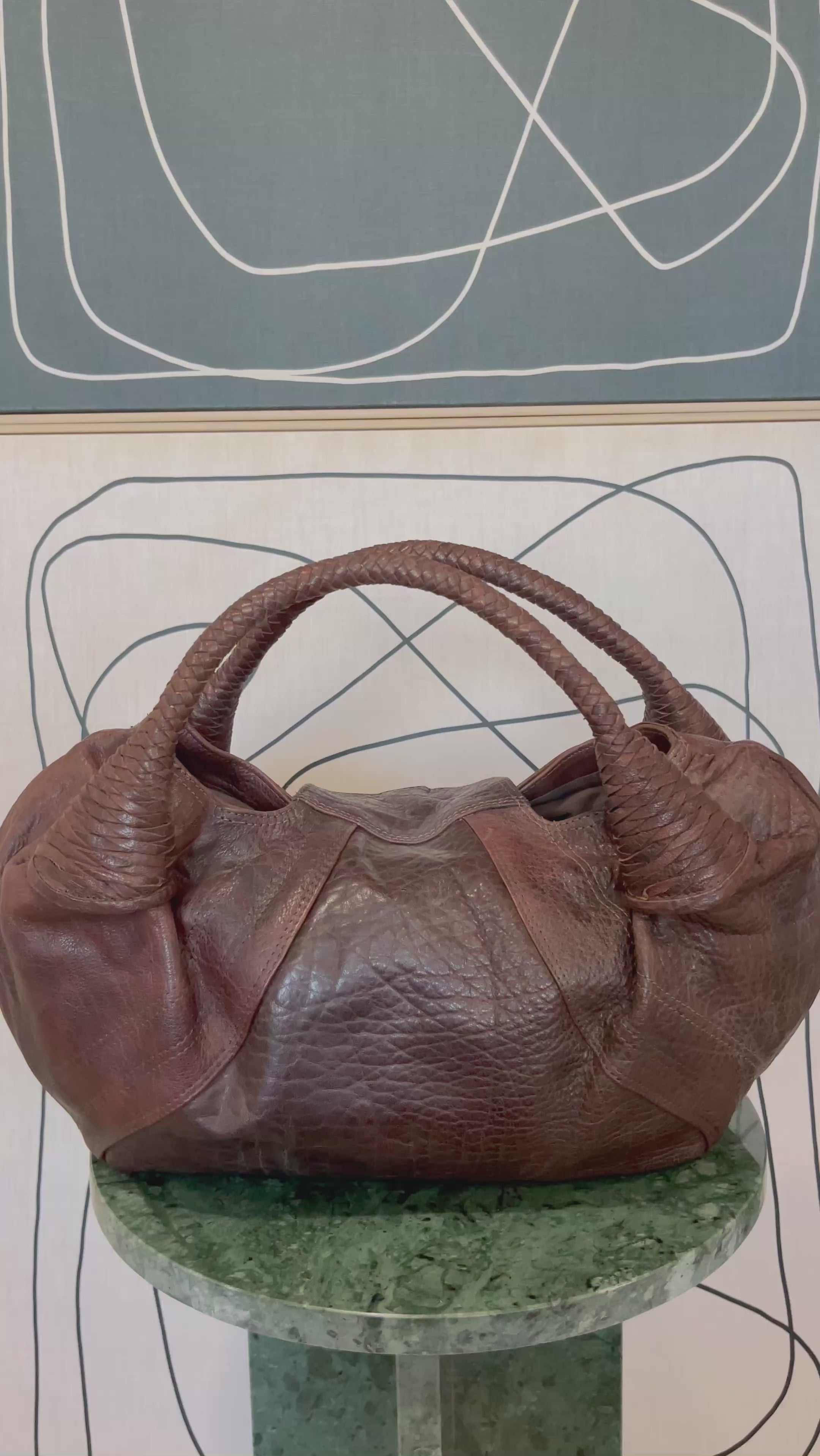 GOLDxTEAL gorgeous leather cognac hobo bag.