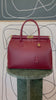 GOLD xTEAL chic Bordeaux leather lock handbag.