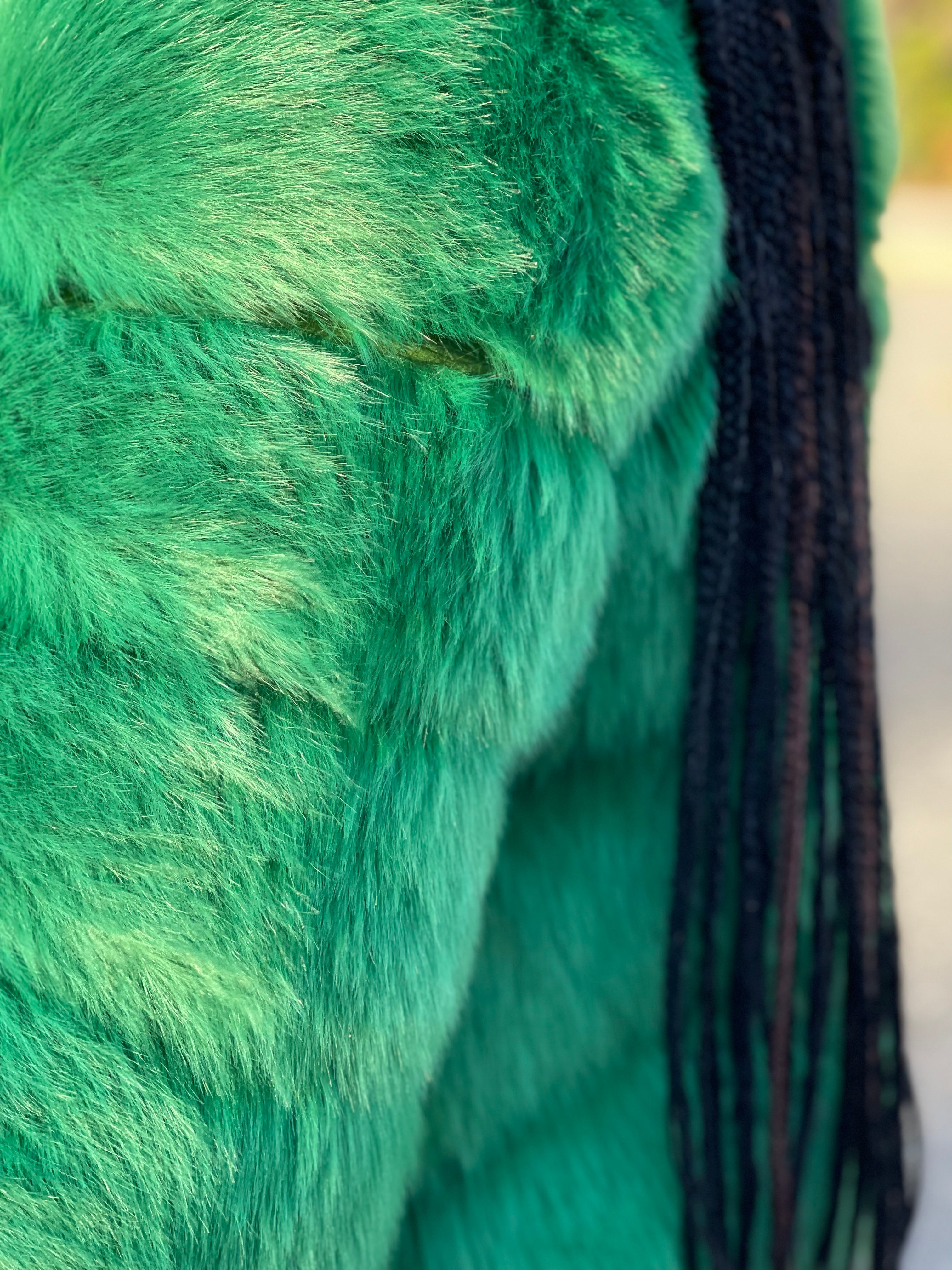 GOLDxTEAL green faux fur coat.