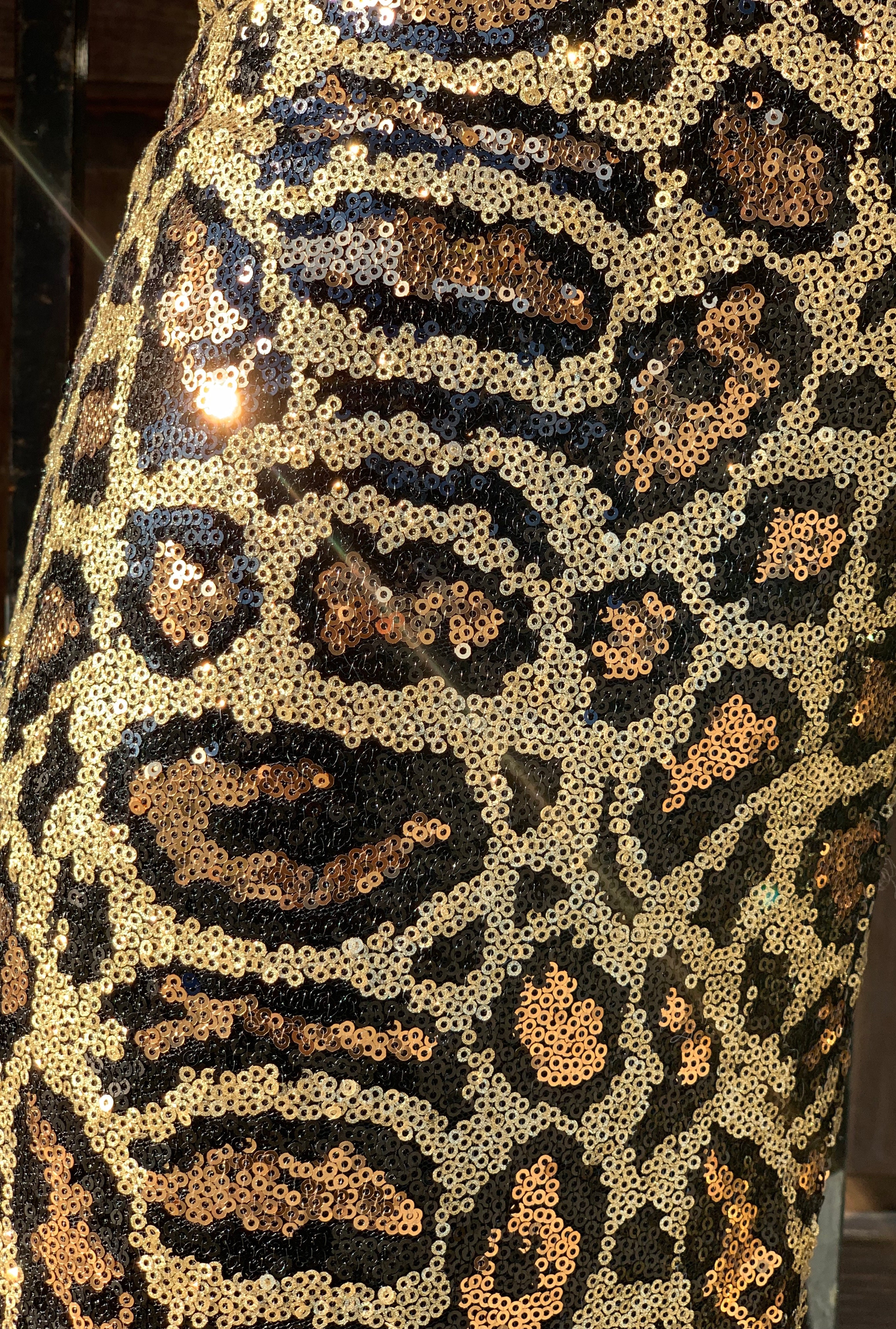 Gold x Teal leopard sequin wide leg pants. Gorgeous waist leopard sequin pants with wide leg bottoms.  Edit alt text