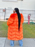 GOLDxTEAL orange faux fur coat.