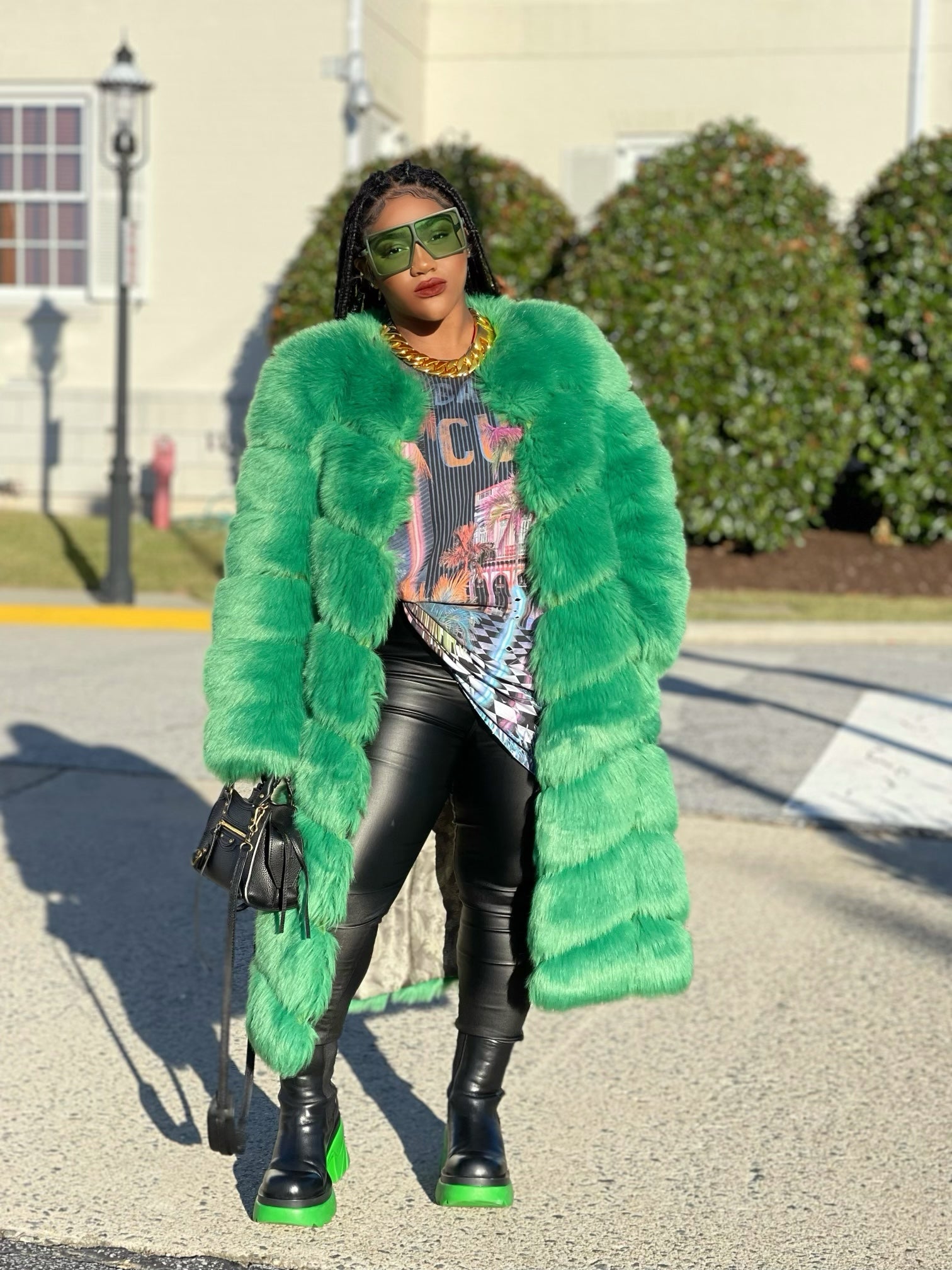 GOLDxTEAL green faux fur coat.
