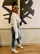 GOLDxTEAL stylish cropped white button up shirt. Modern asymmetrical button up shirt with  a raw hem line.