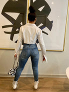 GOLDxTEAL stylish cropped white button up shirt. Modern asymmetrical button up shirt with  a raw hem line.