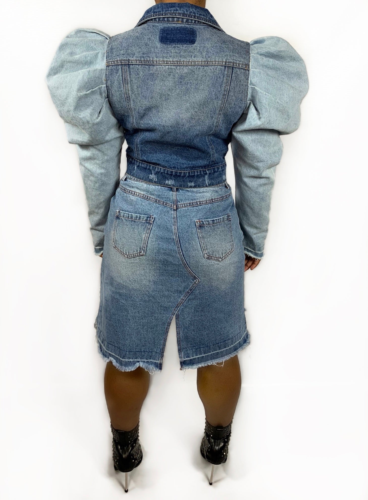 GoldxTeal distressed denim mini skirt. Statement making denim skirt with raw edges, high front and low back, asymmetrical cut.
