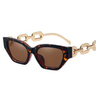 GOLDxTEAL tortoise cat eye sunglasses with metal chain arms.