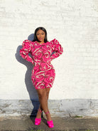 GOLDxTEAL pink printed knitted mini dress. Stylish knit mini dress with exaggerated puff sleeves.