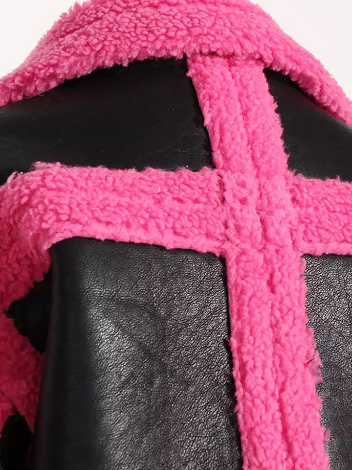 GOLDxTEAL pink and black faux shearling jacket.