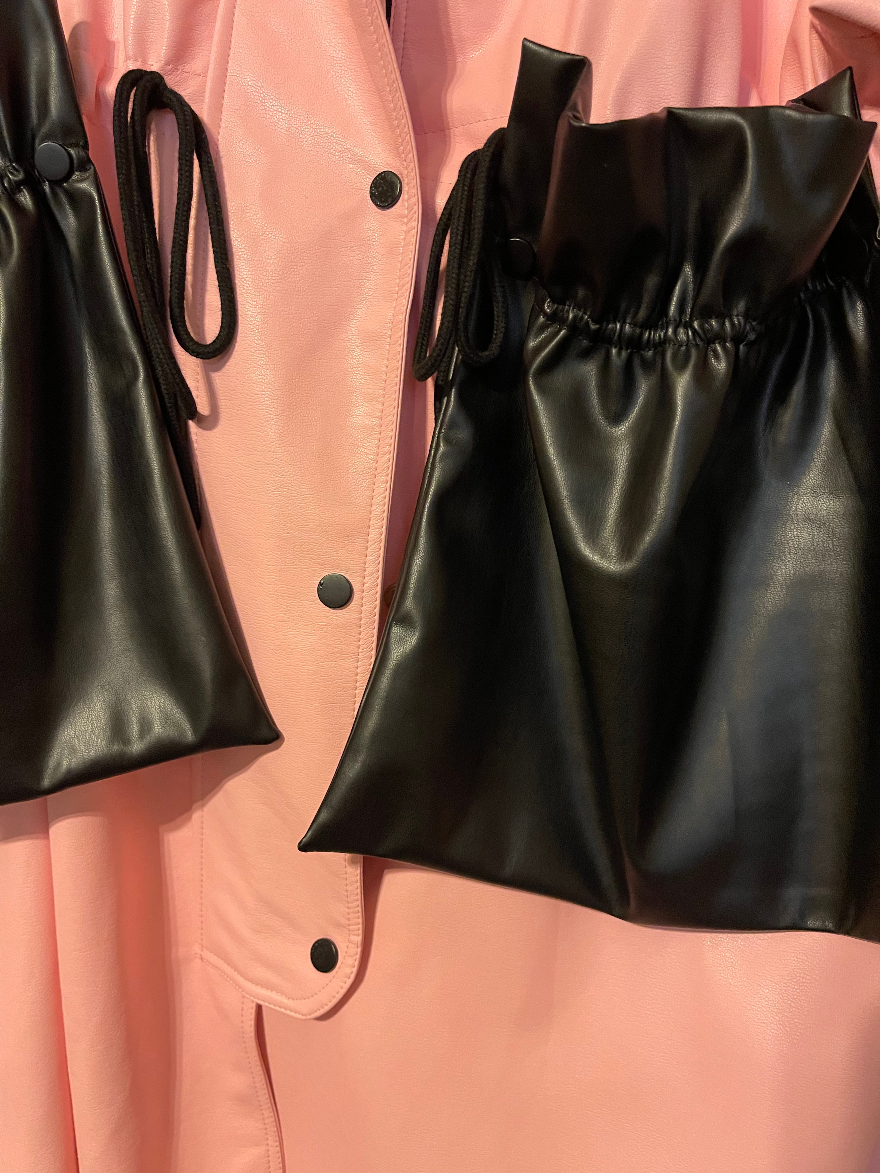 GOLDxTEAL pink vegan leather anorak trench coat. Gorgeous pink faux leather trench accented with oversized pockets.
